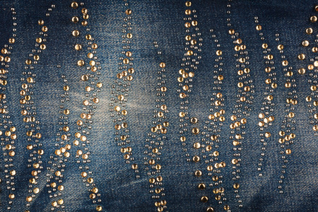 Fashionable background jeans in rhinestones