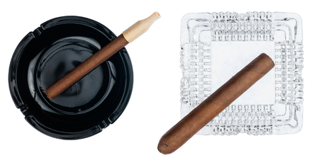 Two ashtray with cigars, isolated on a white backgroundの写真素材