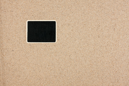 Pointer, ads board in the form rectangle in the sand, can be used as backgroundの写真素材