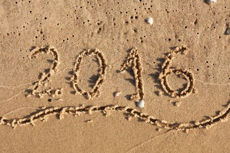 Year 2016 Written On Beach Sand
