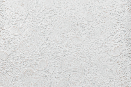 The texture of white patterned leather, as a backgroundの写真素材