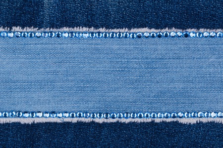 Fashionable background,  jeans and blue  rhinestones, with space for your text