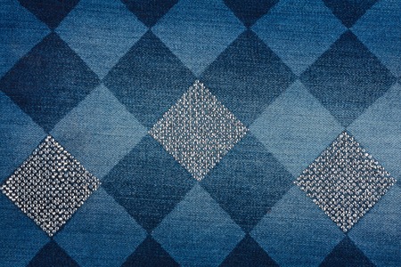 Fashionable background,  jeans  inlaid rhinestones, can be used as textureの写真素材