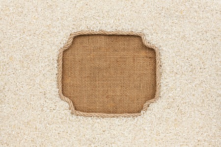 Figured frame made of rope with rice grains on sackcloth, with place for your creativity