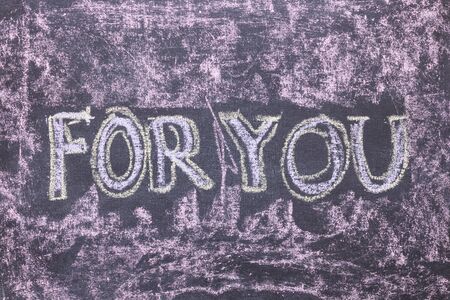 For you. Chalk lettering on blackboard. Multi colored inscription on a chalkboardの写真素材