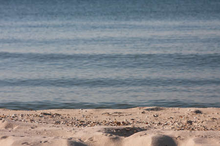 Tropical beach view. Calm and relaxing empty beach scene, blue sky and white sand. No peopleの写真素材