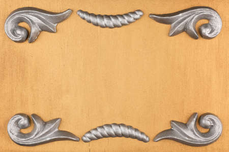 Silver stucco molding on an empty golden background. With space for design, text place. Top viewの写真素材