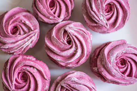 Pink home-made marshmallows with black currant.