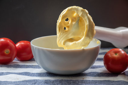 mayo home made close up view. Homemade mayonnaise made by organic eggs with yellow yolk. Making mayoの写真素材