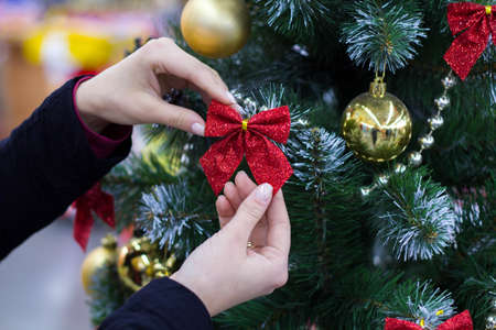 Christmas toys on the Christmas tree closeupの写真素材