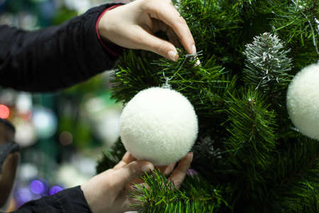 Christmas toys on the Christmas tree closeupの写真素材