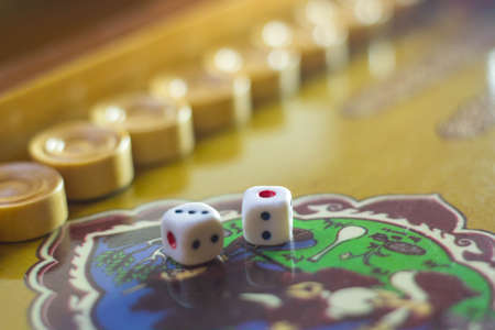 Dices set.Play backgammon table game.Rolling dice in old board game.