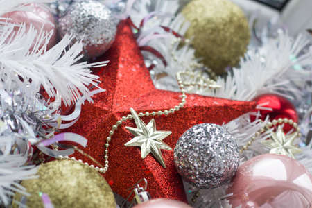 Christmas balls and asterisk in tinsel close up.の写真素材