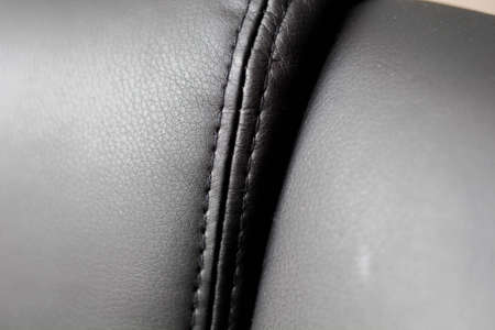 Part of the leather chair close-up. Leather chair with a seam.の写真素材