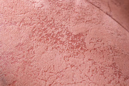 Burgundy fabric close-up sofa with a variety of patternsの写真素材