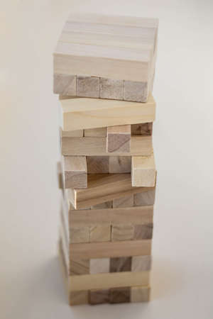 Wood block tower game on white background