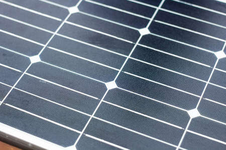 Bench with solar panel on street close-up