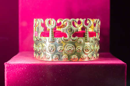 Gold and jewell-studded Kings crown close-up in the gallery