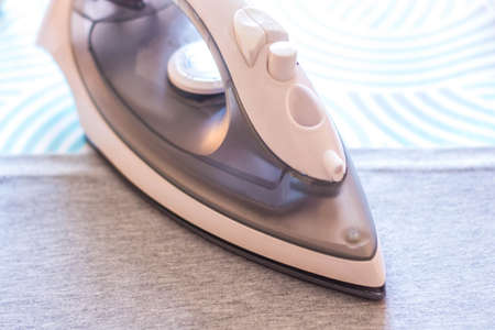 iron on ironing boardの写真素材