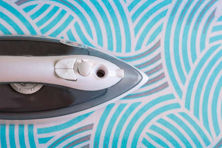 iron on ironing boardの写真素材