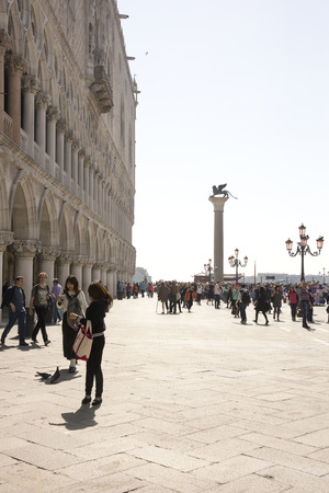 Venice, Italy- March 30, 2014:Tourists walk on the Piazza San Marco のeditorial素材