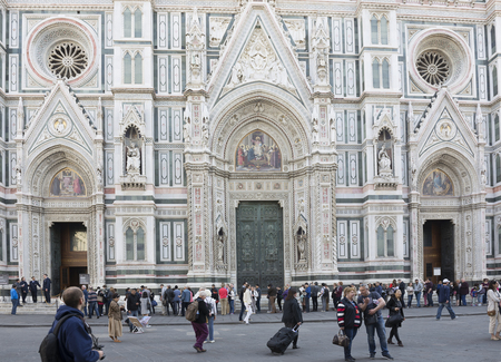 Florence, Italy- March 31, 2014:Tourists visiting the sights on the Piazza San Giovanni and del Duomoのeditorial素材
