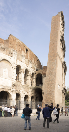 Rome, Italy- April 02, 2014:Tourists visiting the Coliseum (started to build in 72 AD under Vespasian, and in 80 AD amphitheater was consecrated by Titus)のeditorial素材