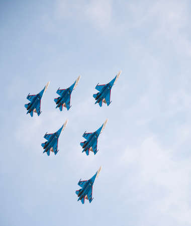 Rostov-on-Don, Russia- March 21, 2015:  Aerobatic team Russian Knights on the Su-27 at the event for...