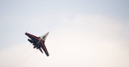 Rostov-on-Don, Russia- March 21, 2015:  Aerobatic team Russian Knights on the Su-27 at the event for...
