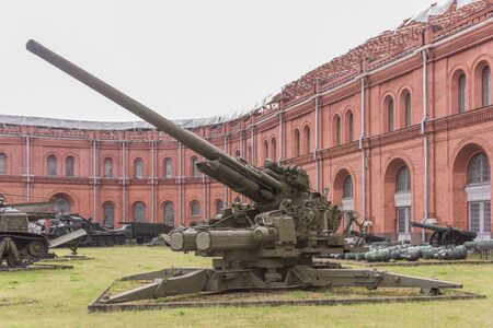 RUSSIA; SAINT-PETERSBURG - JULY 8- 130-mm anti-aircraft gun KS-30, mod. 1952. Weight, kg: guns-23 000 ,shell-33 in military history museum  on July 8; 2015 in St. Petersburgのeditorial素材