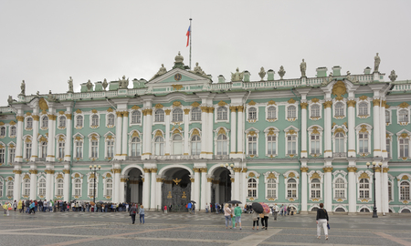 RUSSIA; SAINT-PETERSBURG- JULY 11-Tourists at the Palace Square in the rain on July 11; 2015 in St. Petersburgのeditorial素材