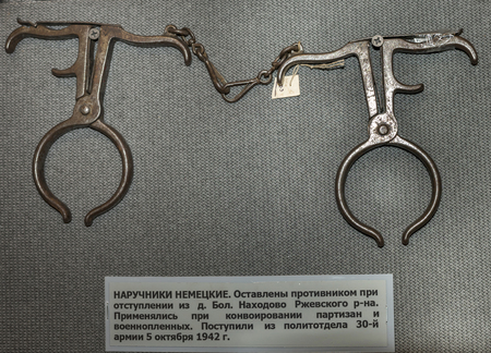 MOSCOW, RUSSIA- DECEMBER 16- Handcuffs German. Apply with escorting partisans and prisoners of war...