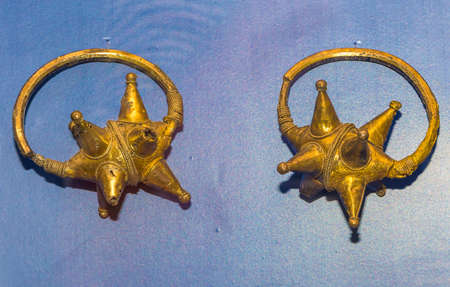 AZOV, RUSSIA- SEPTEMBER 20- Pendants temple. 13th Century AD. Silver, gilding in the museum - reserve on September 20;2015 in Azovのeditorial素材