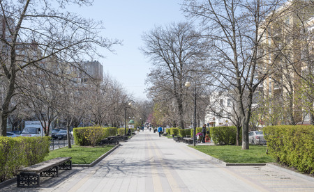 ROSTOV-ON-DON, RUSSIA- APRIL 07- On the street Pushkin walking citizens, girl speaks by phone on April 07; 2016 in Rostov-on-Donのeditorial素材