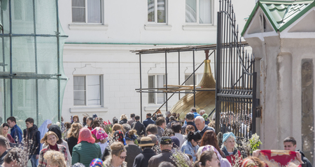 ROSTOV-ON-DON, RUSSIA- APRIL 24 -On Palm Sunday people are recruited into the church to the priest...