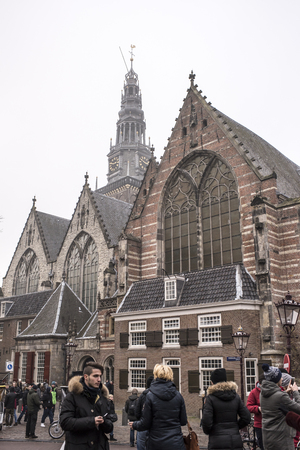 Amsterdam,the Netherlands-December 30,2016:On the street walking people and moving vehiclesのeditorial素材