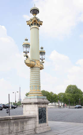Paris,France- April 29, 2017: Rostral column with lanterns on the Place de la Concorde. By area moving vehicles and pedestriansのeditorial素材