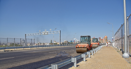 Rostov-on-Don,Russia -September 16,2017: The new dual-car bridge. Conducted the final works. Moving vehicles and pedestriansのeditorial素材