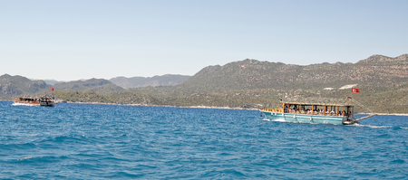 Demre;Turkey-September 08;2017:Swimming pleasure boats with tourists on boardのeditorial素材