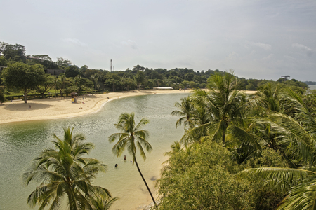 Singapore, Singapore- August 10, 2018: View of Sentosa Palawan Beach from Palawan Island. People resting on the shoreのeditorial素材