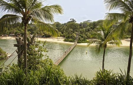 Singapore, Singapore- August 10, 2018: View of Sentosa Palawan Beach from Palawan Island. People resting on the shoreのeditorial素材