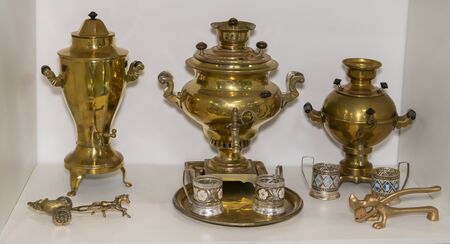 Kamensk-Shakhtinsky, Russia-August 17, 2019: Samovars - hot-water, for making tea, a copper vessel, with a pipe and a roasting pan inside- in the Museum of the Legend of the USSRのeditorial素材