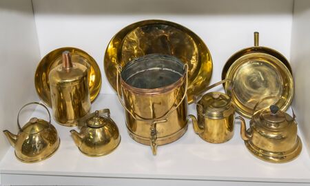Kamensk-Shakhtinsky, Russia-August 17, 2019: Dining copper utensils of the early 20th century- in...