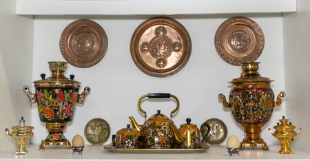 Kamensk-Shakhtinsky, Russia-August 17, 2019: Samovars - hot-water, for making tea, a copper vessel, with a pipe and a roasting pan inside- in the Museum of the Legend of the USSRのeditorial素材