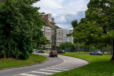 Rio de Janeiro, Brasil-  February 27, 2020: Rodrigo de Freitas Lagoon. Avenue Epitacio Pessoa. Cars and pedestrians moveのeditorial素材
