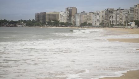 Ocean surf on the beach of Copacabana. Rio de Janeiro, February 2020