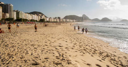 Rio de Janeiro, Brasil- March 05, 2020: Citizens swim and sunbathe on the beach of Copacabana