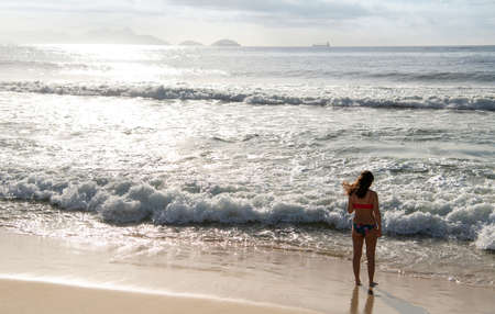 Rio de Janeiro, Brasil- March 05, 2020: Citizen sunbathe on the beach of Copacabanaのeditorial素材