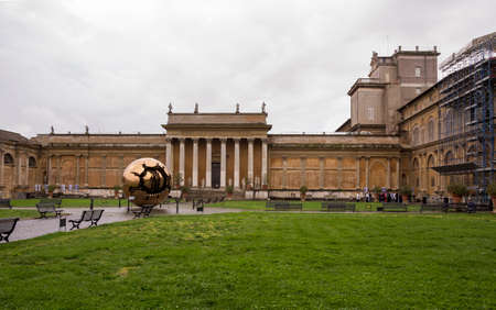 VATICAN,ITALY-APRIL 04-Tourists visiting the attractions at the Court of the Pigna on April 04,2014 in Vaticanのeditorial素材