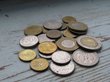 polish coins on the wood backgroundの写真素材